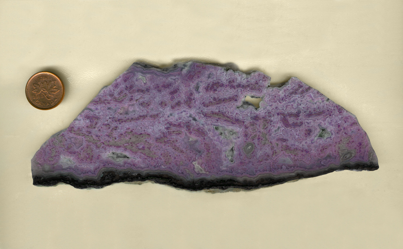 A bright slab of purple Royal Aztec Agate from Mexico, with lace and eye patterns.