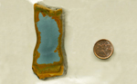 A slab of Owyhee Picture Jasper from Idaho, with a blue sky in the center and a bright brown rim.