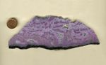 A bright slab of purple Royal Aztec Agate from Mexico, with lace and eye patterns.