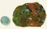 Swirling green, blue and red slab of Christmas Flame Agate from Mexico.