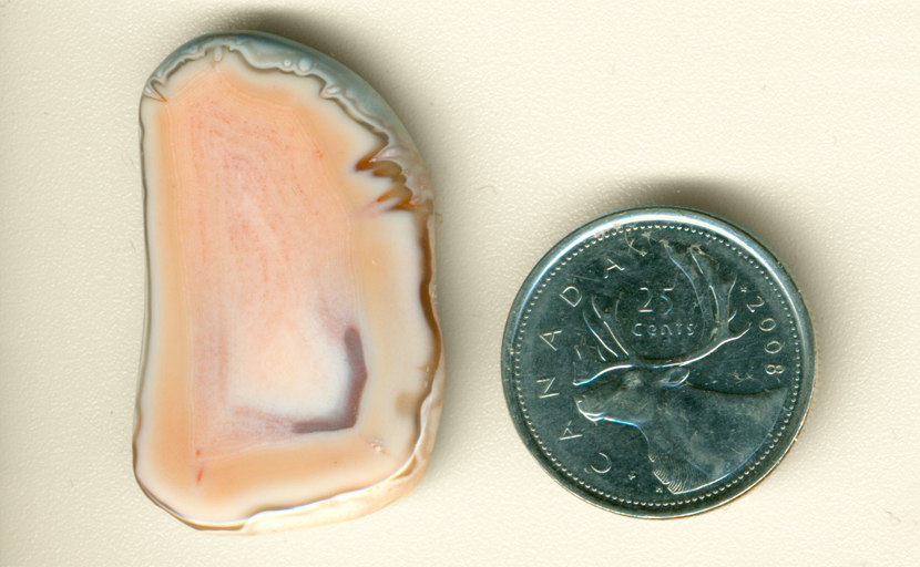 Delicate purple shape in a pink freeform Australian Agate.