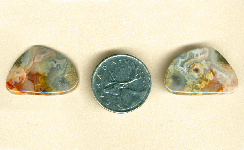 2 views of red, white, blue, orange and yellow sagenite freeform polished Crazy Lace Agate from Mexico.