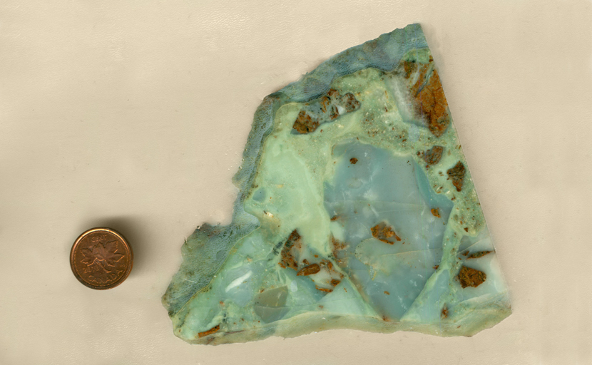 Ocean Picture Rock from British Columbia, with blue and greenish blue material and the occasional reddish brown angular inclusion. 