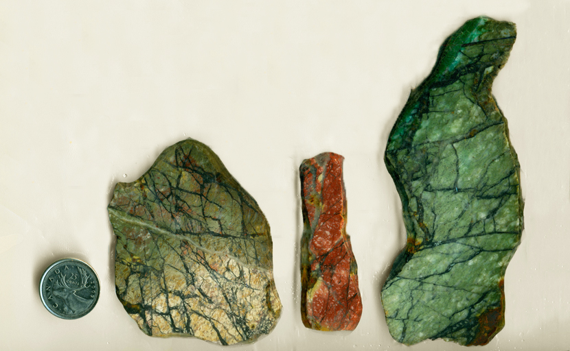 3 slabs of Green and Red Jasper, with lines like forest shadows and details of other colors.