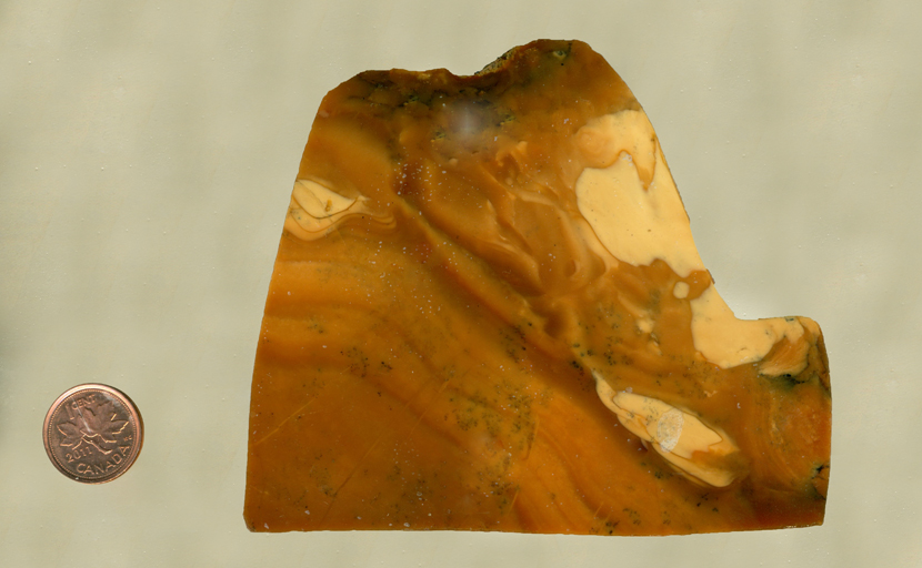 A brown and cream-colored slab of jasper, swirled together like butterscotch.