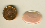 Calibrated oval polished Coyamito Agate cabochon from Mexico, with a pink fortification and light pink spangles.