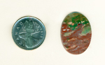 Calibrated polished Fancy Jasper cabochon from India, part green and part burgundy, with flecks of gold and sea-blue.