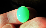 Bright green cabochon of Australian Chrysoprase that lights up in the sun.