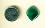Bright blue-green shape floating in clear gem silica, a Malachite Crystal in Gem Silica from Globe Co., Arizona.