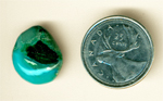 Bright blue and green patterned cabochon in Chrysocolla-in-Chalcedony from the Inspiration Mine in Globe County, Arizona.