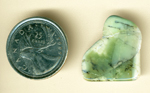 Blue-green and white freeform Australian Chrysoprase, with black dendritic patterns.