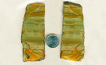 2 slabs of Succor Creek landscape jasper from Oregon, with orange and yellow on a blue-green background. 