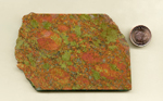 Unakite slab with strong contrasting orange and green mottling.